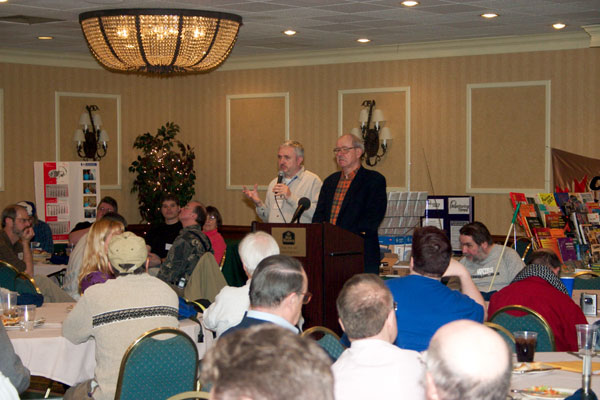 Sheldon Harvey and Alan Bosch at the podium of the revival meeting
