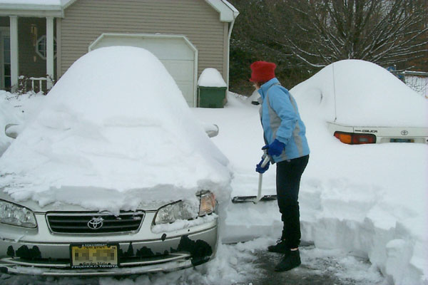 Laura shoveling